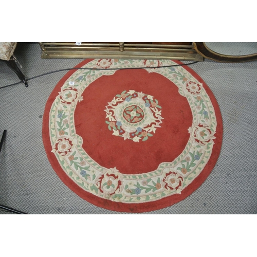 731 - A circular floor rug