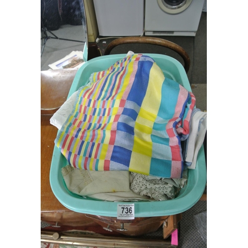 736 - A basket of assorted linen table cloths etc