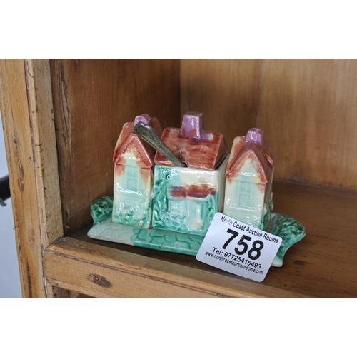 758 - A cruet set in the form of an country house