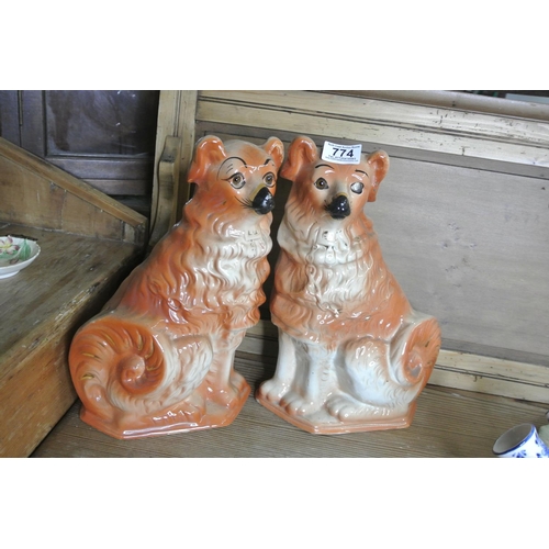 774 - A pair of mantle dogs