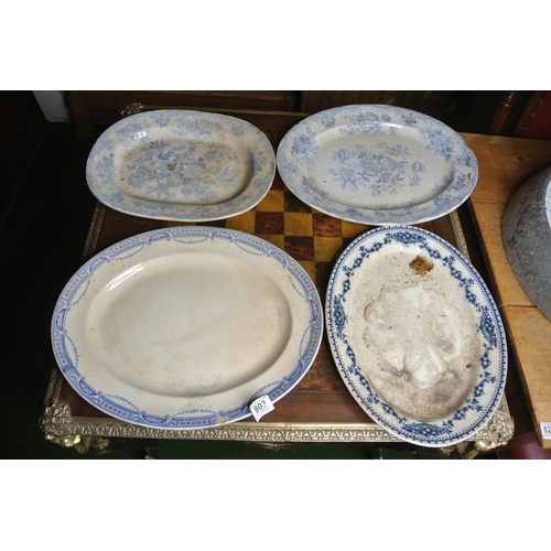 803 - Four large blue and white platters