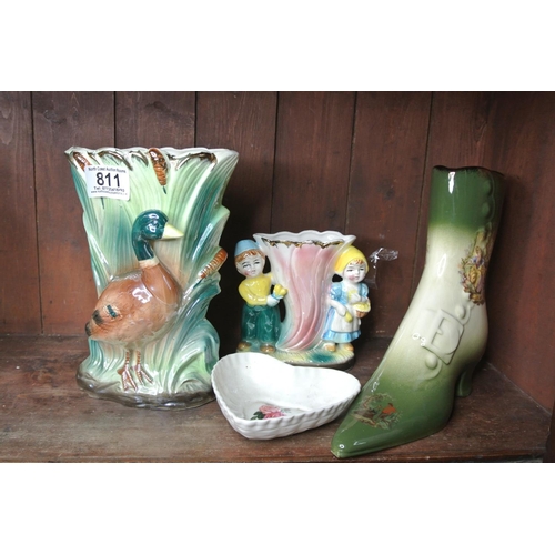 811 - A large pottery ornamental boot and three other pieces