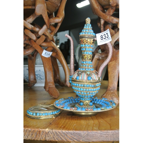 833 - A small brass beaded vase and stand