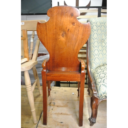 207 - A stunning antique oak shield back chair.