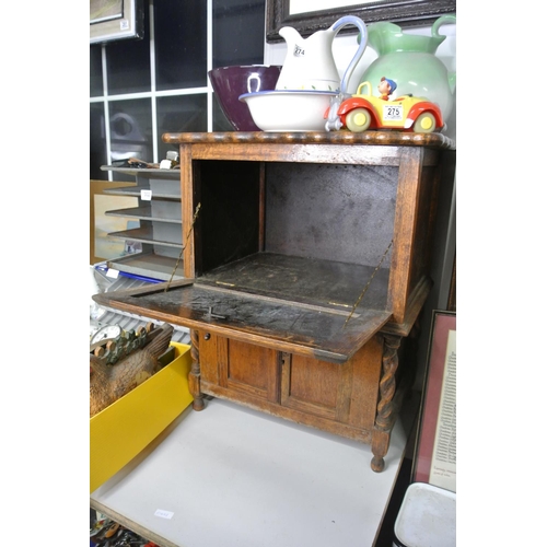 276 - A low set Pine cocktail cabinet with barley twist detail