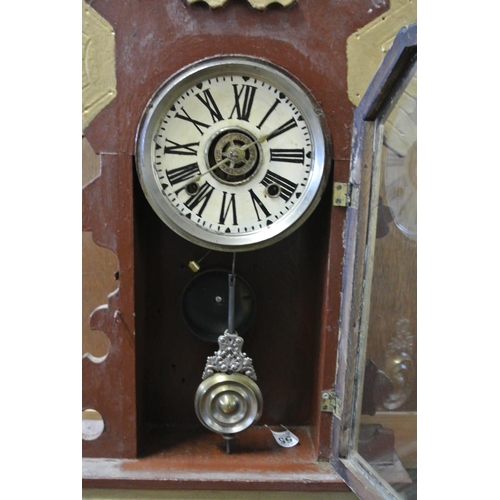 55 - An antique gingerbread clock for restoration.