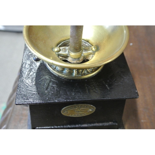 66 - A Victorian coffee grinder with brass label.