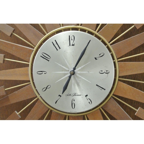 247 - A stunning vintage/ Mid Century teak Seth Thomas starburst clock.