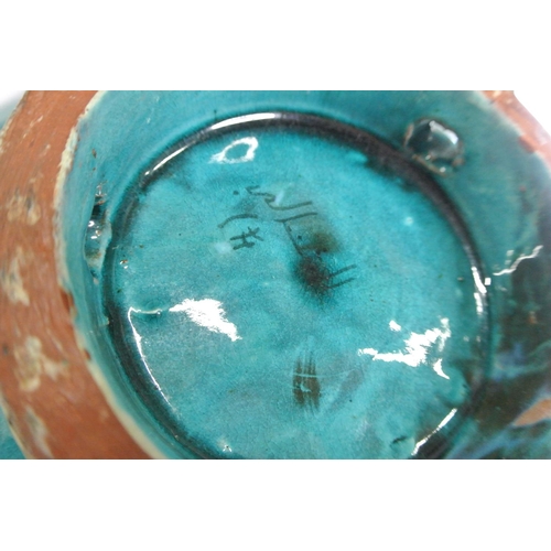 296 - A studio pottery bowl