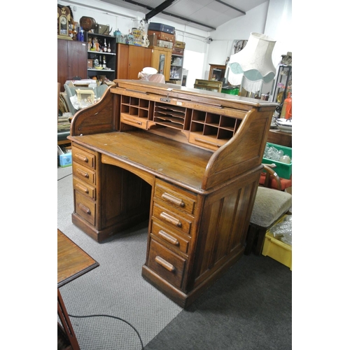 360 - A stunning antique roll top desk.