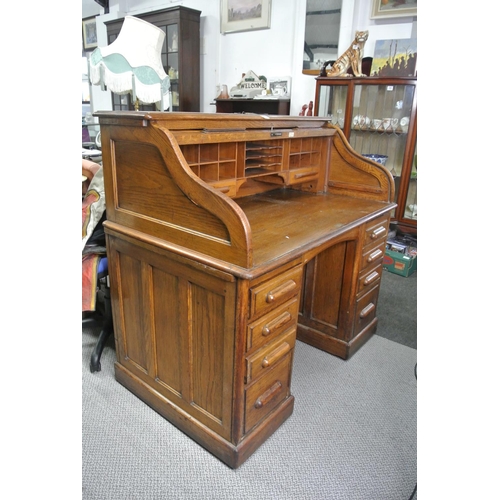 360 - A stunning antique roll top desk.