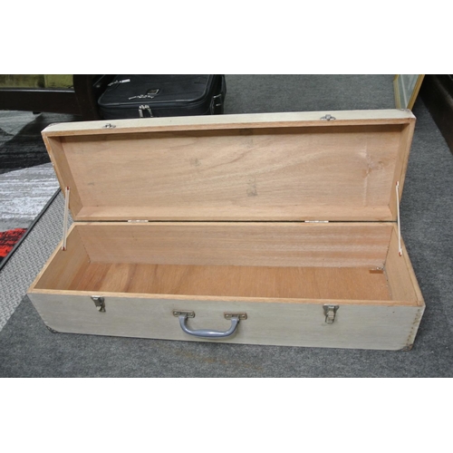 377 - A wooden storage box with handle