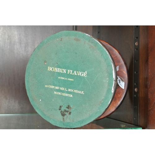 394 - A large antique bobbin flange.