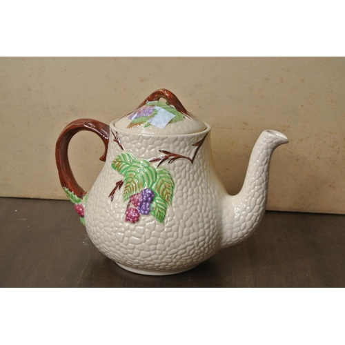 454 - A decorative Wade tea pot