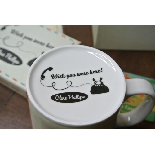 471 - A large collection of Clare Phillips 'Wish you were here!' china plates, coasters and mugs.