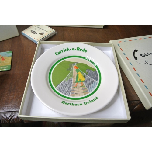 471 - A large collection of Clare Phillips 'Wish you were here!' china plates, coasters and mugs.