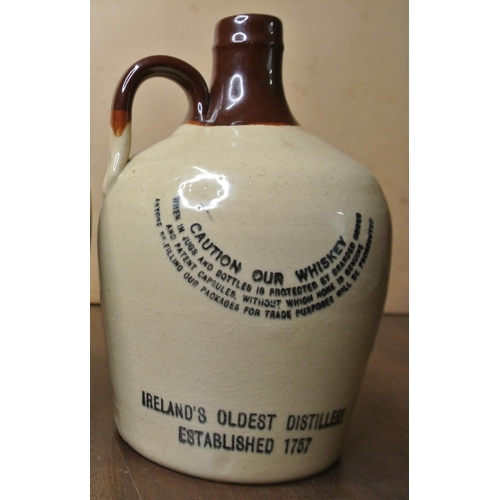 476B - A stoneware whiskey bottle which read 'Locke's Kilbeggan Irish Whiskey. John Lockes & Cold. Kilbegga... 