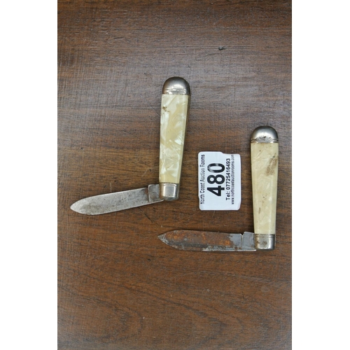 480 - A pair of Richmond's Sheffield pen knives with mother of pearl handles.