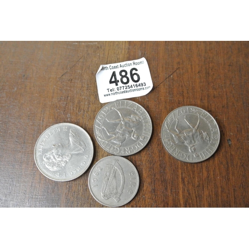 486 - An assortment of collectable coins, which includes commemorative queen Elizabeth items.