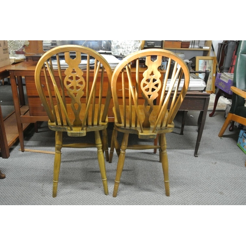 320 - A pair of oak framed kitchen chairs