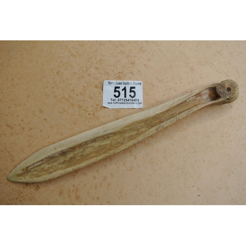 515 - A Scrimshaw bone.