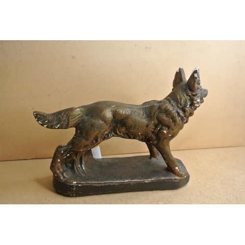 527 - A ceramic German Shepard that reads 'BOBY'.