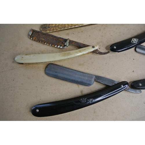 537 - A large collection of antique & vintage cut throat razors, to include brands such as Slater Bros, Jo... 