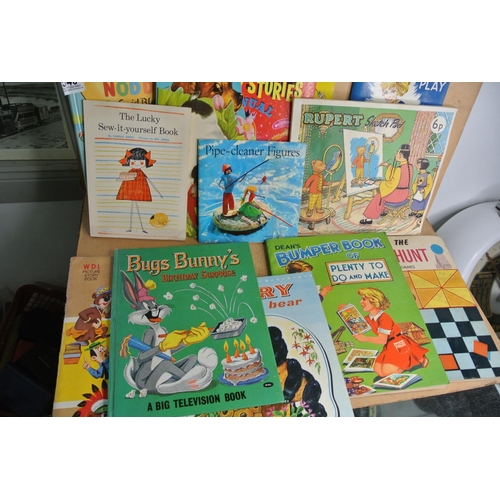 540 - A collection of vintage childrens books to inlclude, 'Noddy', 'Rupert the Bear' & more.