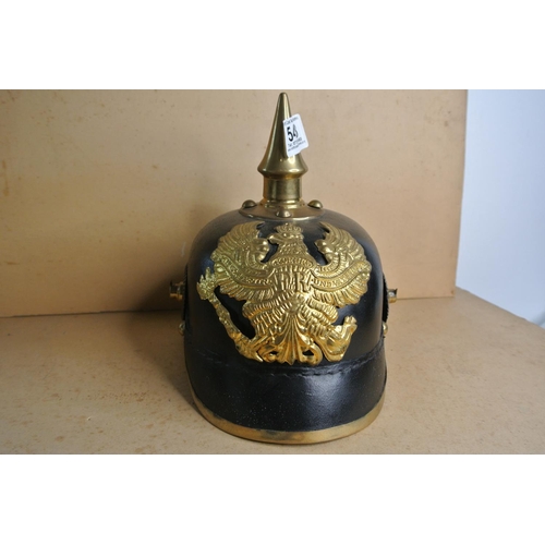 543 - A reproduction German helmet.