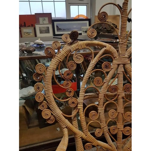 383B - A stunning vintage rattan peacock/throne chair.