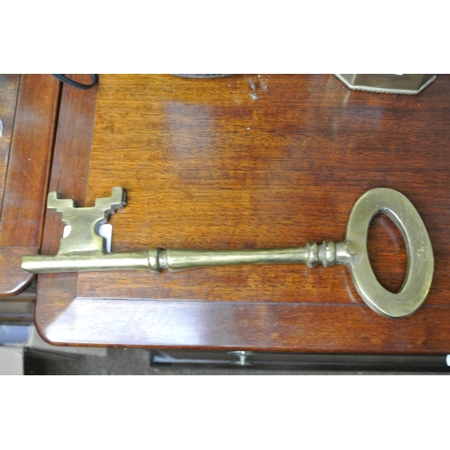 161 - A large decorative vintage brass key.