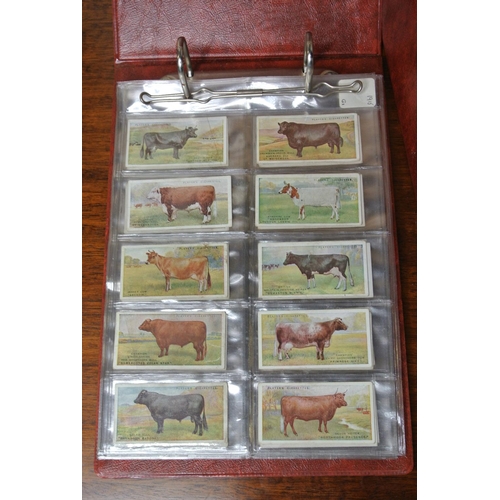 167 - 2 cigarette card albums with contents.