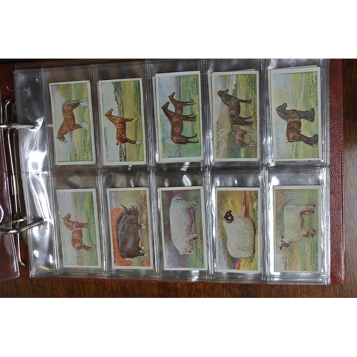 167 - 2 cigarette card albums with contents.