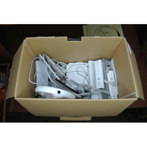 418 - A Nintendo Wii with various accessories.