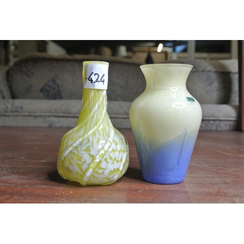 424 - 2 decorative glass vases to include a Caithness glass vase.