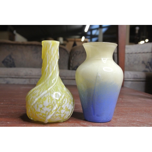 424 - 2 decorative glass vases to include a Caithness glass vase.