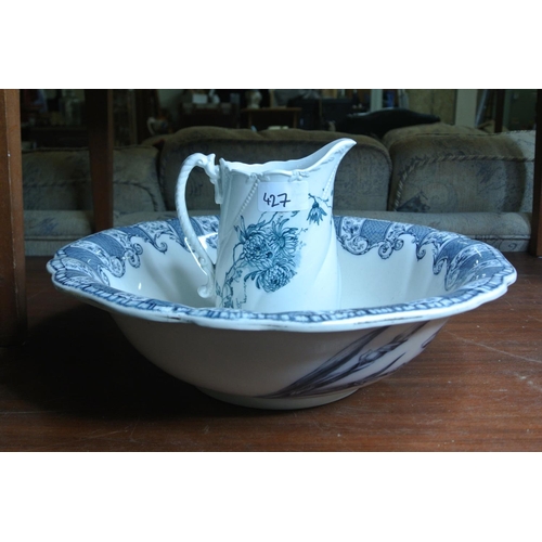 427 - An antique ceramic jug & similar basin.