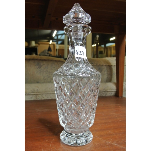 429 - A Waterford Crystal decanter (damage to stopper)