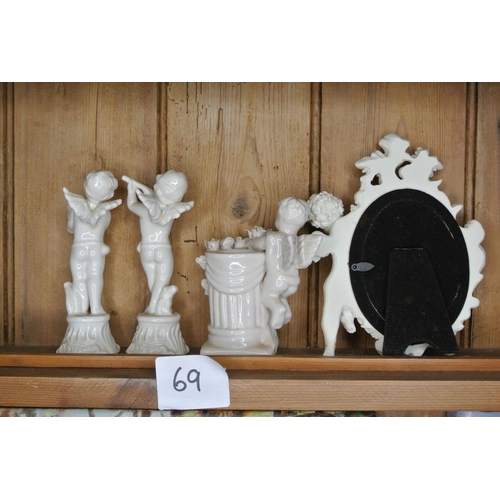 69 - An assortment of Cherub ceramics.