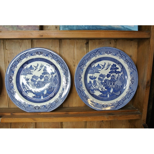 76 - A set of 4 Churchill Willow pattern plates.