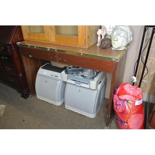 105 - A desk with brass trim & 2 drawers.