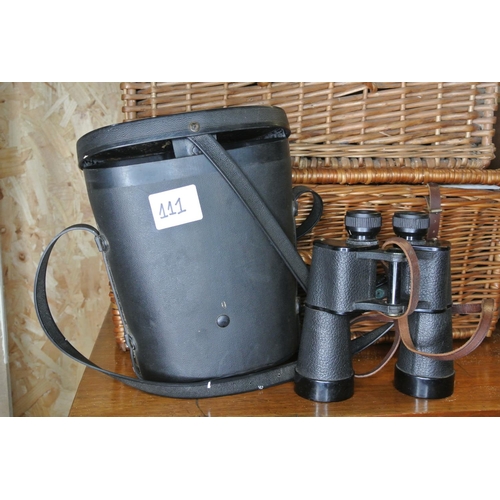 111 - A cased set of binoculars.