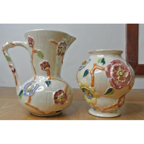 146 - A vintage Arthur Wood handled jug and matching vase