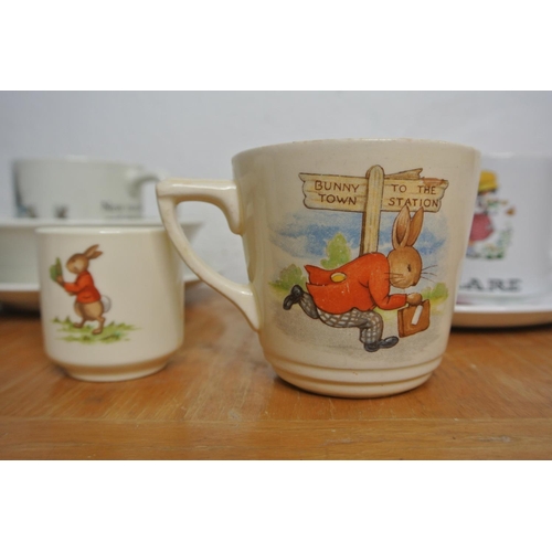 177 - A lot of children's pottery pieces including Wedgwood Peter Rabbit, Royal Doulton Bunnykins and Purb... 