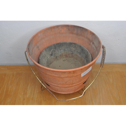 204 - A small fire bucket.