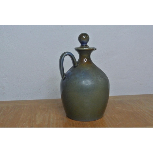 211 - A Wade Irish porcelain poteen jug