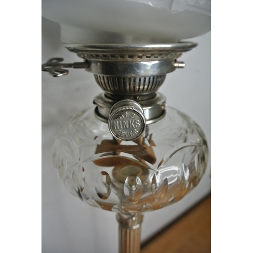 243 - A superb tall silver plated oil lamp and etched green shade, produced by Hawksworth Eyre & Co