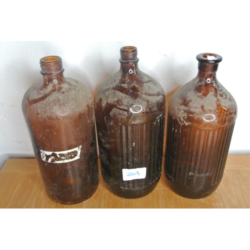 267 - 3 large vintage chemist bottles.