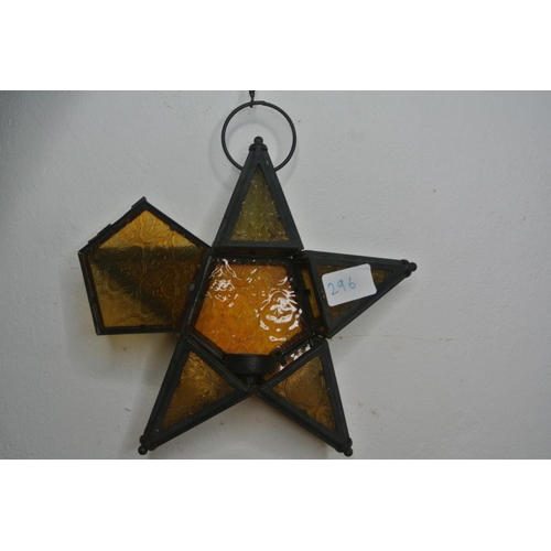 296 - A vintage hanging coloured glass star.