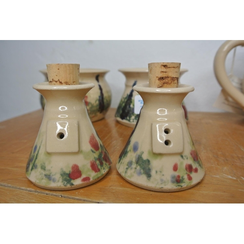 310 - A collection of antique ceramic items to include a jug, candlesticks and more produced by Ballydouga... 